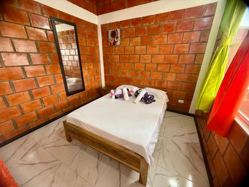 Ένα ή περισσότερα κρεβάτια σε δωμάτιο στο Apartamento Piso 3 Casa 5 Hospedaje Atlantis