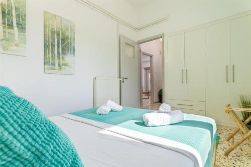 Ένα ή περισσότερα κρεβάτια σε δωμάτιο στο Golden Key apartments
