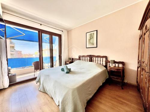 Кровать или кровати в номере Le Sulky, proche de la mer, balcon, parking