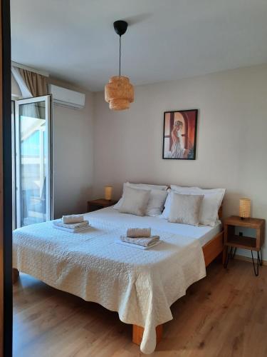 Katil atau katil-katil dalam bilik di Apartman Tino Zagrebačka ulica 51, Makarska