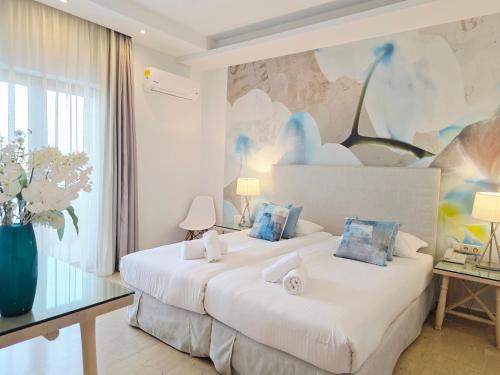Postel nebo postele na pokoji v ubytování Korina Hotel