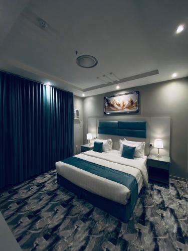 Katil atau katil-katil dalam bilik di زهرة الربيع للشقق المخدومة zahrat alrabie Hotel