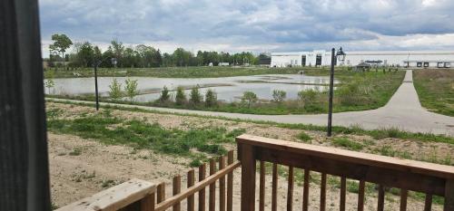 a view of a river from a porch at Luxury 5 Bed Retreat for 12 with Gourmet Kitchen in Paris