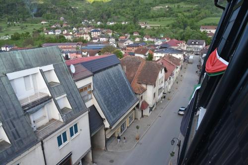 a view of a town with buildings and a street at Cattleya hotel in Plav