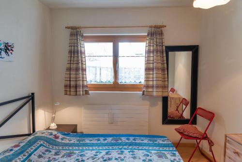 Cama o camas de una habitación en Chesa Filia - La Punt
