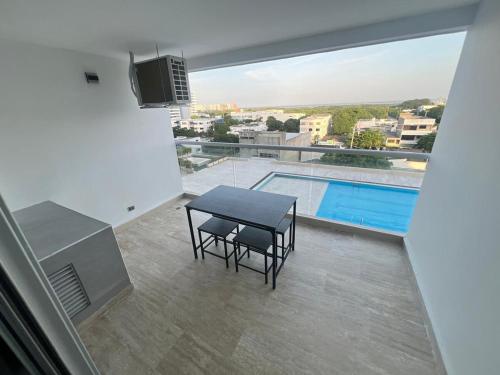 Bazén v ubytování Apartasuite en Cartagena nebo v jeho okolí