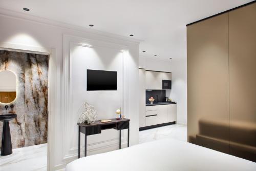 TV o dispositivi per l'intrattenimento presso Dama Luxury Suites Pompei
