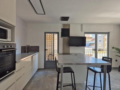 Η κουζίνα ή μικρή κουζίνα στο Sunset 14 Alba