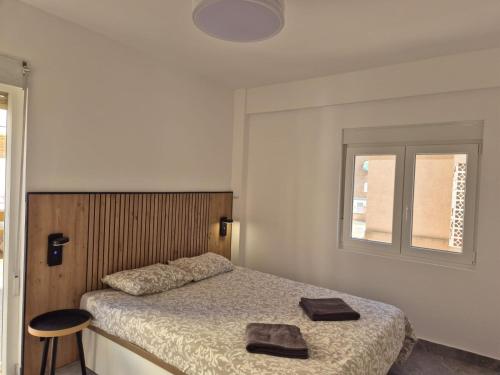 Ένα ή περισσότερα κρεβάτια σε δωμάτιο στο Sunset 14 Alba