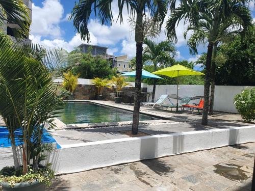 Piscina de la sau aproape de 'Papaya' 1-bedroom apartment, 1st floor