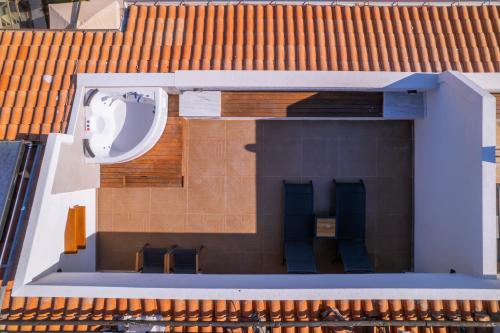 an overhead view of a building with a circle on the roof at Molino Hotel in Kas