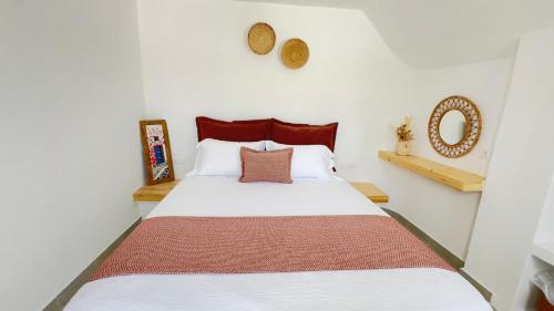 Ένα ή περισσότερα κρεβάτια σε δωμάτιο στο Michelangelo Suites