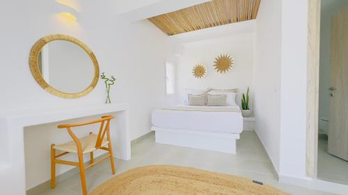 Ένα ή περισσότερα κρεβάτια σε δωμάτιο στο Michelangelo Suites