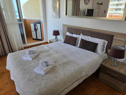 Ένα ή περισσότερα κρεβάτια σε δωμάτιο στο Benal Beach Apartment