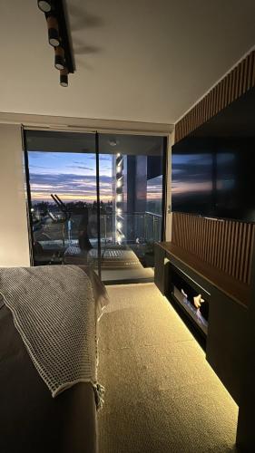 Katil atau katil-katil dalam bilik di Luxury Flat -fireplace and confort