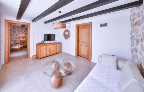 a living room with a couch and a table at Molino Hotel in Kas