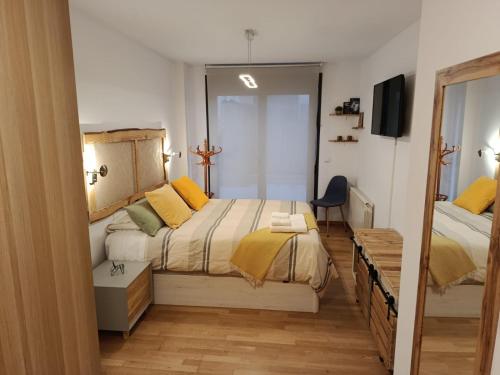 Postel nebo postele na pokoji v ubytování El mirador de la Reina