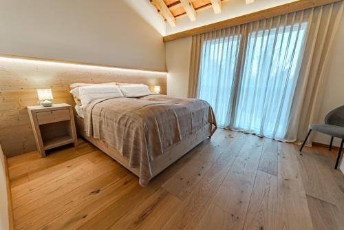 Ένα ή περισσότερα κρεβάτια σε δωμάτιο στο Divigna Hospitality - Vineyards Maison