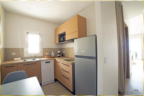 Una cocina o zona de cocina en Résidence Roc e Mare