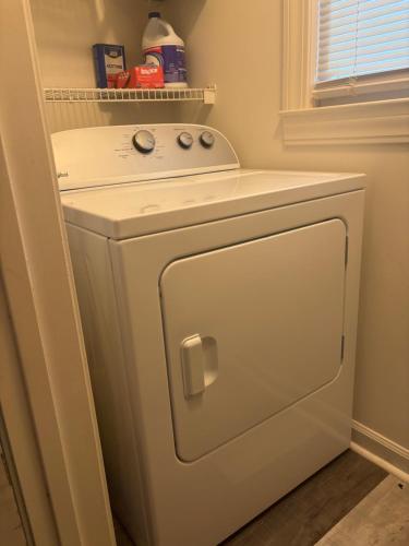 a white washer and dryer in a kitchen at Breezy Corner in Myrtle Beach