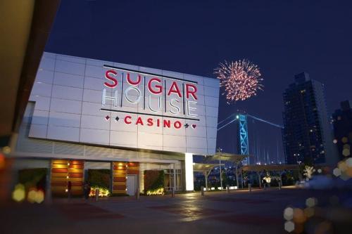 a building with a sign that reads suiger house casino at Heart of Downtown Delight in Philadelphia