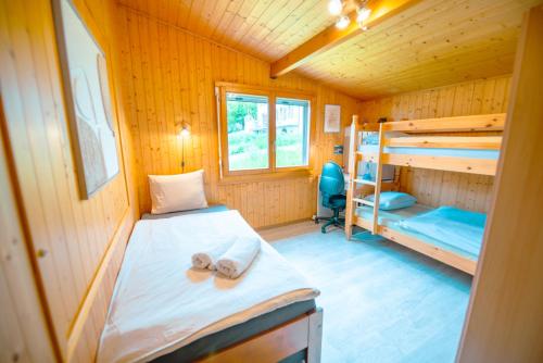Postel nebo postele na pokoji v ubytování Chalet vue Alpes et lac
