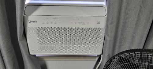 a computer is sitting in a curtain at Luxury 2 Bed 1 Bath Fully Private in Chula Vista