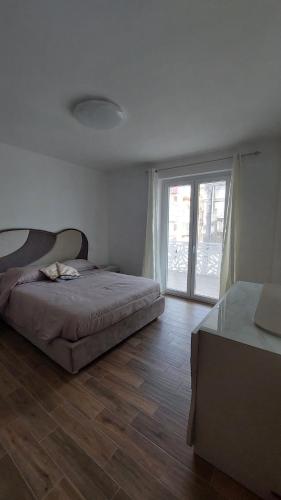 Ένα ή περισσότερα κρεβάτια σε δωμάτιο στο Casa Aurora