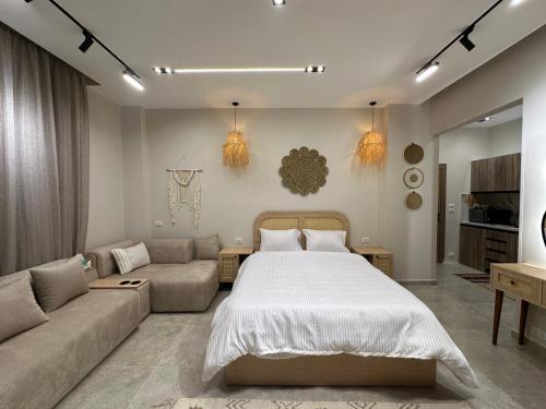 Ένα ή περισσότερα κρεβάτια σε δωμάτιο στο New Cairo Chic Studio 4