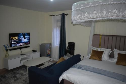 Postel nebo postele na pokoji v ubytování Southside Juja 1 Bedroom