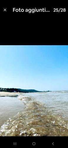 a picture of a beach with the ocean at Casetta nel gargano in Cagnano Varano