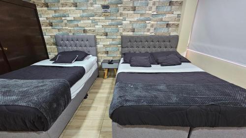 Postel nebo postele na pokoji v ubytování Roma House V- Campin Movistar El Cubo