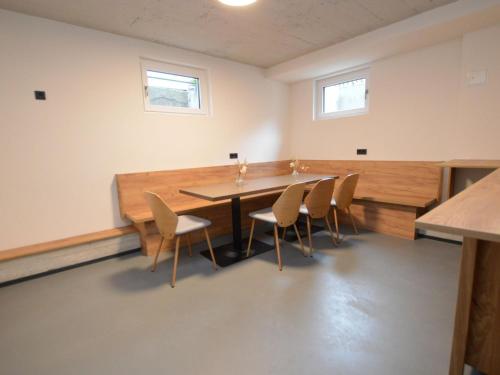 a conference room with a table and chairs at Leni Top 6 in Dienten am Hochkönig