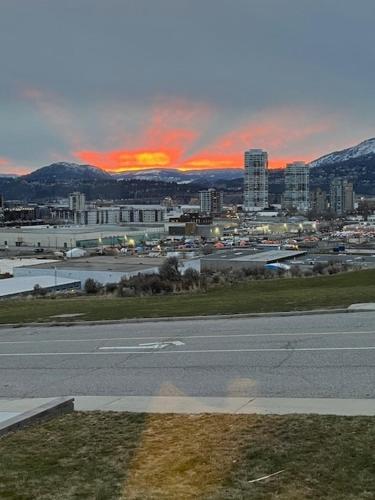 a view of a city with a road and a city at Knox Mountain Vista 2 Bdrm Suite in Kelowna