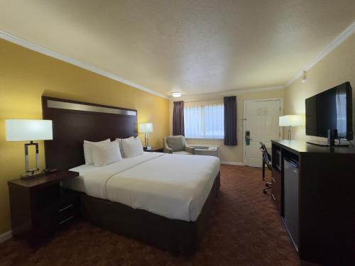 Ένα ή περισσότερα κρεβάτια σε δωμάτιο στο Quality Inn Ukiah