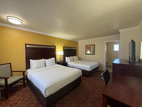 Ένα ή περισσότερα κρεβάτια σε δωμάτιο στο Quality Inn Ukiah