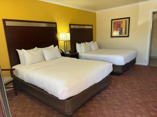 Ένα ή περισσότερα κρεβάτια σε δωμάτιο στο Quality Inn Ukiah