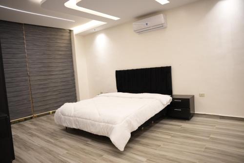 Llit o llits en una habitació de Lumen villa