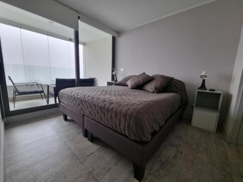 Postel nebo postele na pokoji v ubytování Modern apartment in Montemar