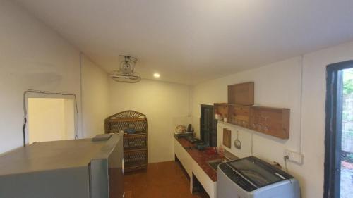 Majoituspaikan NISETH Home keittiö tai keittotila