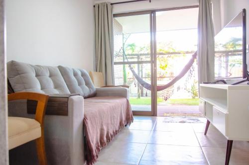 Giường trong phòng chung tại Condomínio village mediterrâneo