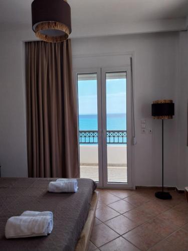 Ένα ή περισσότερα κρεβάτια σε δωμάτιο στο Ostria View