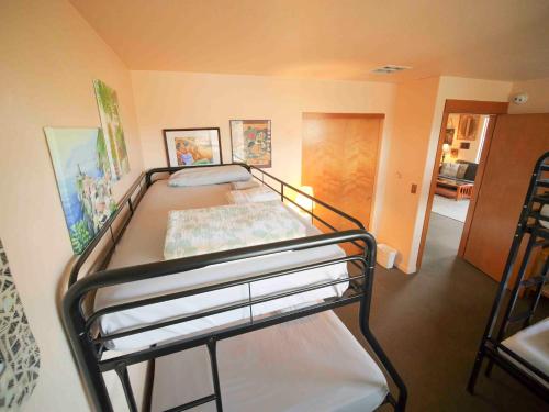 a bedroom with a bunk bed in a room at Ashland Commons Hostel in Ashland