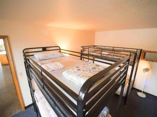 a couple of bunk beds in a room at Ashland Commons Hostel in Ashland