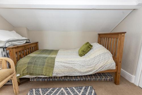 Un ou plusieurs lits dans un hébergement de l'établissement Springwell Inn