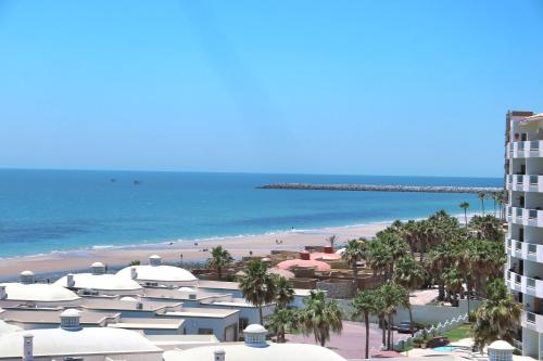 a view of the beach from a resort at Beachfront Condo on Sandy Beach, Las Palmas Resort, 24hrs Security, Free Parking, Free Wi-Fi in Puerto Peñasco