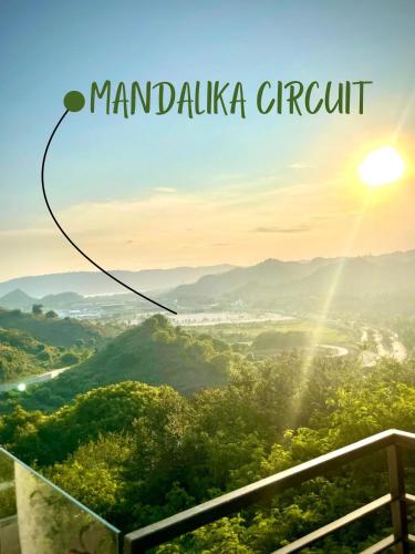 a view of a valley with the sun in the sky at Truntum Boutique Mandalika in Kuta Lombok