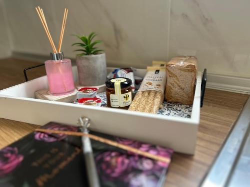 a white drawer with products on top of a table at Garden House in Kalamata