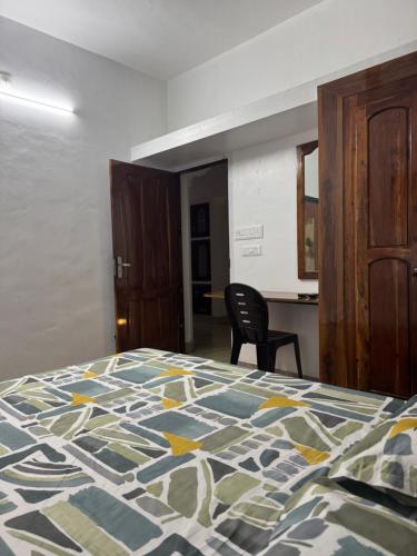 Niharika Homestayにあるベッド