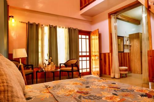 Cama o camas de una habitación en Boho Grove Cafe & Stay, Tirthan Valley